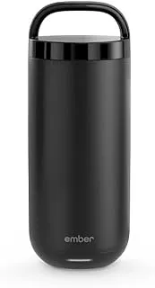 Enjoying a warm drink from the Ember Temperature Control Smart Mug