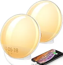Wake-Up Light with colored sunrise simulation brightening a dark room
