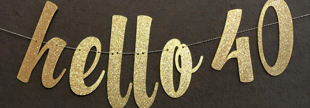 Banner reading 'Hello 40' illustrating 40th birthday gift ideas for men