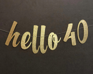 Banner reading 'Hello 40' illustrating 40th birthday gift ideas for men